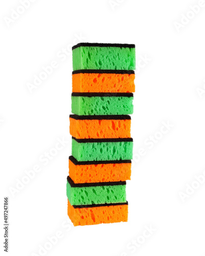 Red and Green Foam Sponge for Washing on White Background. File with Clipping Path.