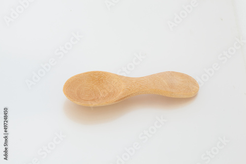 eating  bamboo  smooth  clean  culinary  brown  single  cutout  national  compostable  above  kitchen utensil  overhead  top view  tableware  white background  object  spoon  wooden  isolated  wooden 