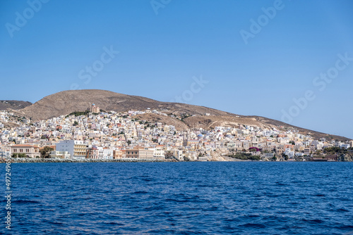 Fototapeta Naklejka Na Ścianę i Meble -  Ermoupoli Syros island Cyclades, Greece. Cityscape, waterfront building, view from the sea.