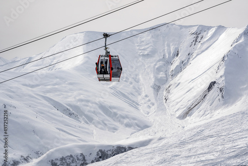 Gondola (Ski Lift) against snow-covered Caucasus Mountains in Distance, Gudauri Ski Resort, Georgia