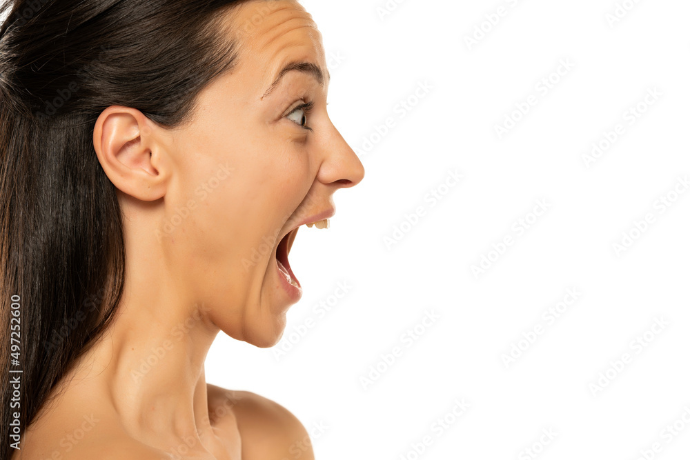 Profile of excited and happy woman on a white background Profile of excited and happy woman on a white background