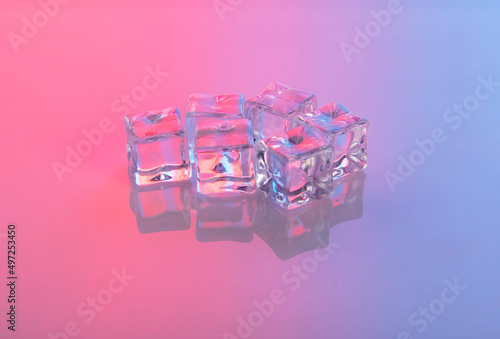 Ice cubes on colorful background Concept art. 