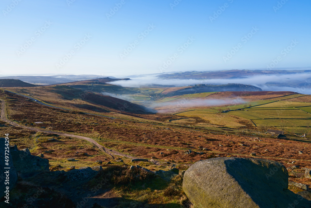 Misty spring morning in Derbyshire from high on Stanage Edge.