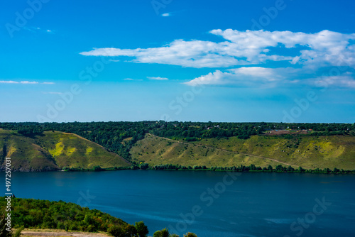 Landscape of beautiful River Dnister with Rocky Mountains in Bakota, Ukraine. Summer Travel serene minimalistic view . 