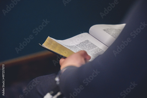 Canvas Print Closeup of a man hand holding the Holy Bible