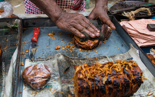 Bangladeshi local people sell Iftar's items at chawkbazar in the capital Dhaka, Bangladesh on the first day of the Muslim fasting month Holly Ramadan on April 3, 2022.  photo