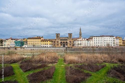 Meadow with sidewalks in front of the cityscape