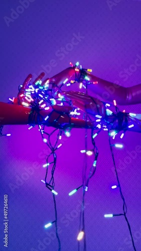 Latex Hands and Christmas Lights