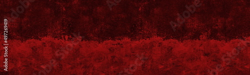 Bloody red concrete wall with old peeling paint surface wide texture. Dark scarlet colour gloomy backdrop. Abstract grunge sinister background © JAYANNPO