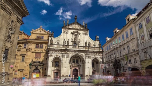 St. Salvator Church timelapse hyperlapse. Part Of Historic Complex In Prague - Clementinum, Czech Republic photo