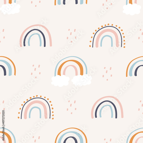 Cute hand drawn seamless pattern with rainbow.