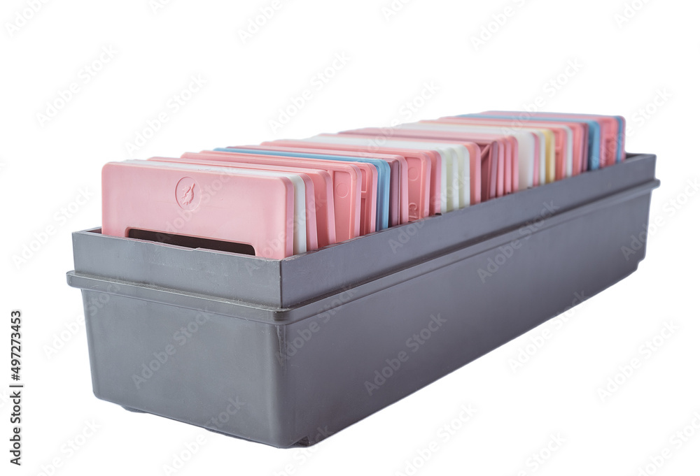 Old slides in a cardboard box on a white background Old slides in a cardboard box on a white background