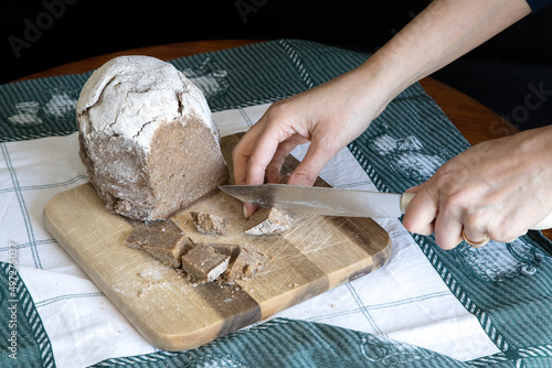 Broa de Avintes, traditional bread from Vila de Avintes, Vila Nova de Gaia, Portugal. Dark bread with corn flour, rye and barley. photo