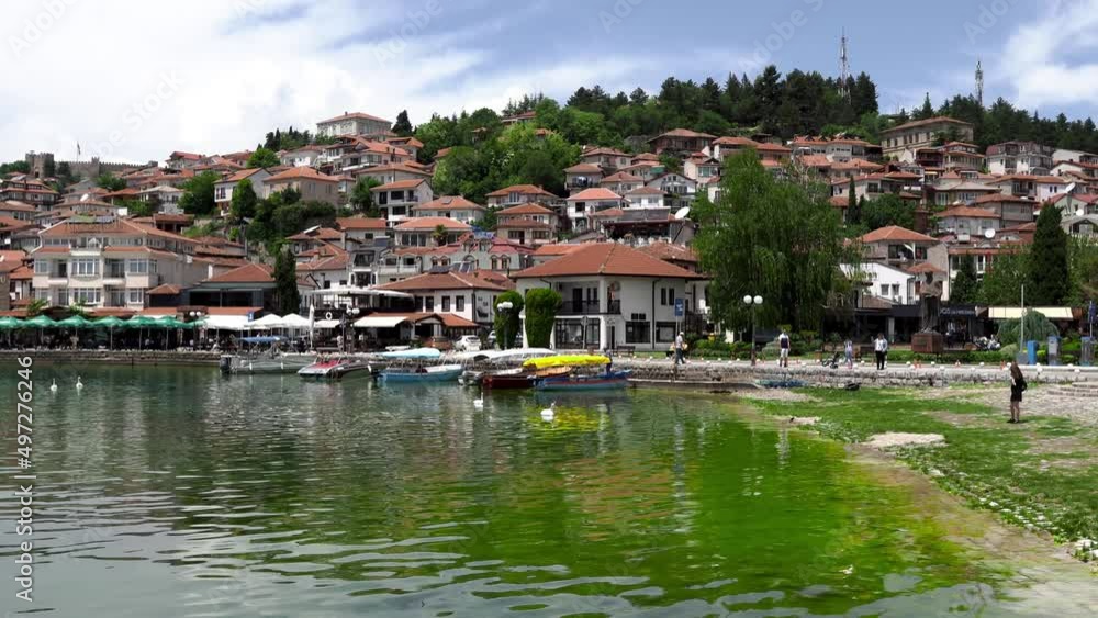 Ohrid North Macedonia 05.27.2021
Scenic view from the pier to Ohrid. City of Ohrid in North Macedonia. A city on the eastern shore of Lake Ohrid. Mountain area. City embankment. Boats near the shore Ohrid North Macedonia 05.27.2021
Scenic view from the pier to Ohrid. City of Ohrid in North Macedonia. A city on the eastern shore of Lake Ohrid. Mountain area. City embankment. Boats near the shore