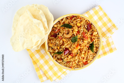 Tomato rice.spicy South Indian rice recipe Tomato pulao or Tomato Rice ,South Indian Thakkali Sadam ,Tomato Bath an Indian vegetarian dish. Healthy nutritious photo