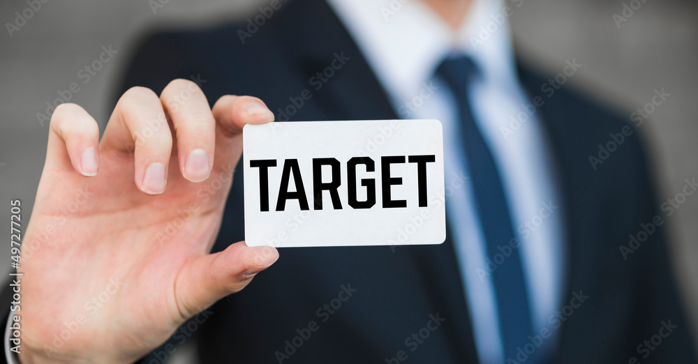 TARGET message on the card held by businessman, business concept TARGET message on the card held by businessman, business concept