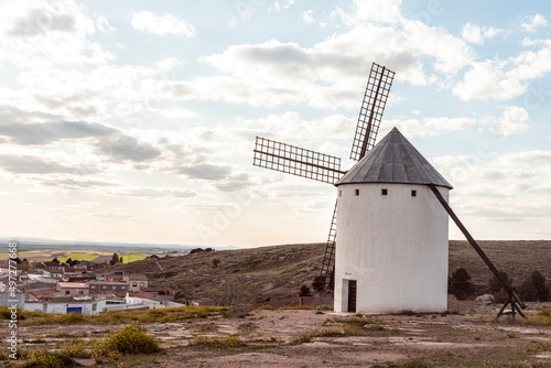 view of a typical Spanish village with a famous windmill