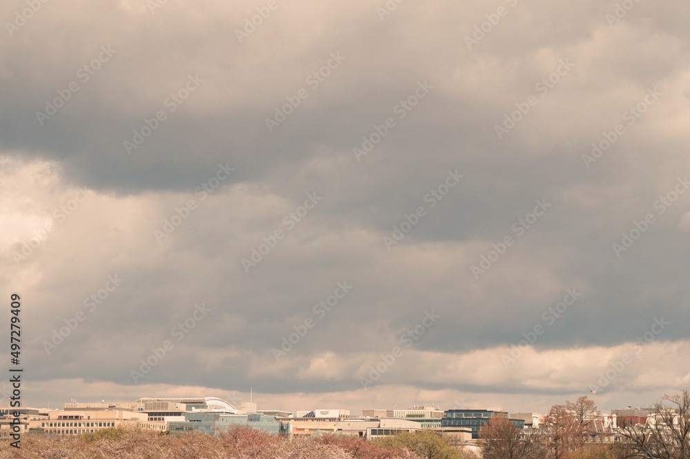 Rooftops of Washington DC under Blue Sky and White Clouds