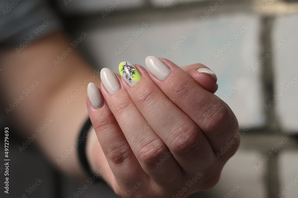 bright neon yellow manicure with a pattern close-up bright neon yellow manicure with a pattern close-up