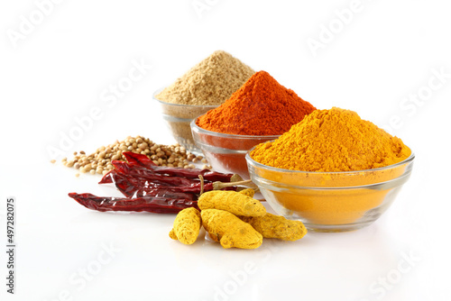 Fototapeta Naklejka Na Ścianę i Meble -  spices,Indian spices, color full spices in glass bowls Chilee,Turmeric, Coriander powders