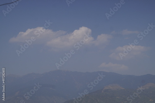 time clouds over the mountains