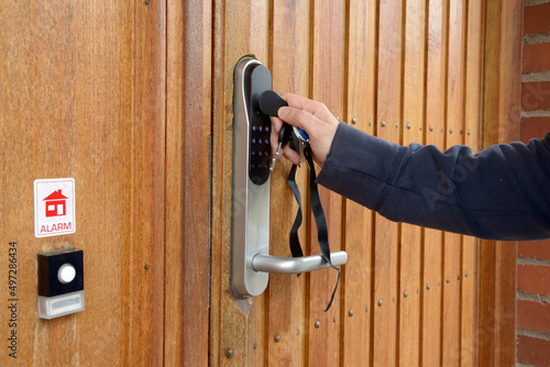 Картината върху платно Opening a residential door with electronic key fob