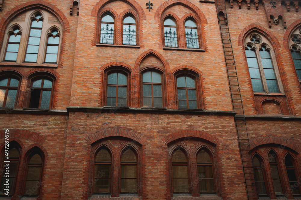 Old building with windows. Beautiful landmark in the city of Munich, in Germany. Tourist attraction.