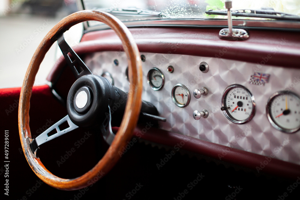 Steering wheel of Old car cockpit, drive on left
