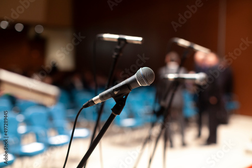 Microphone and blurred auditorium