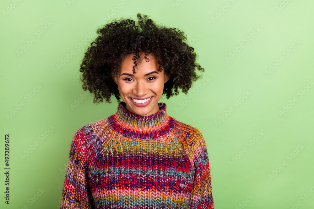 Fototapeta premium Portrait of friendly candid person beaming smile look camera isolated on green color background