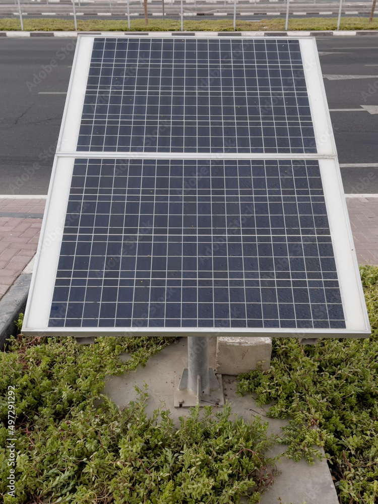 Solar panels installation on the side of a road