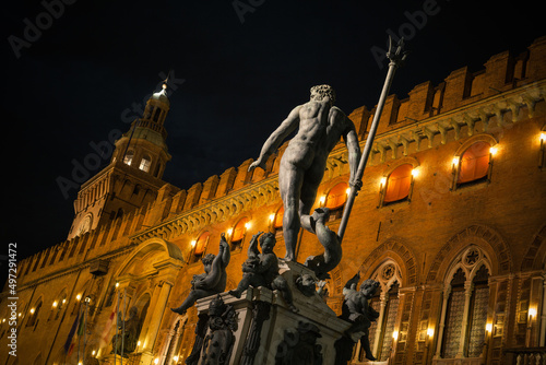 Fountain of Neptune and the Palazzo d'Accursio that is currently the Town Hall of Bologna city