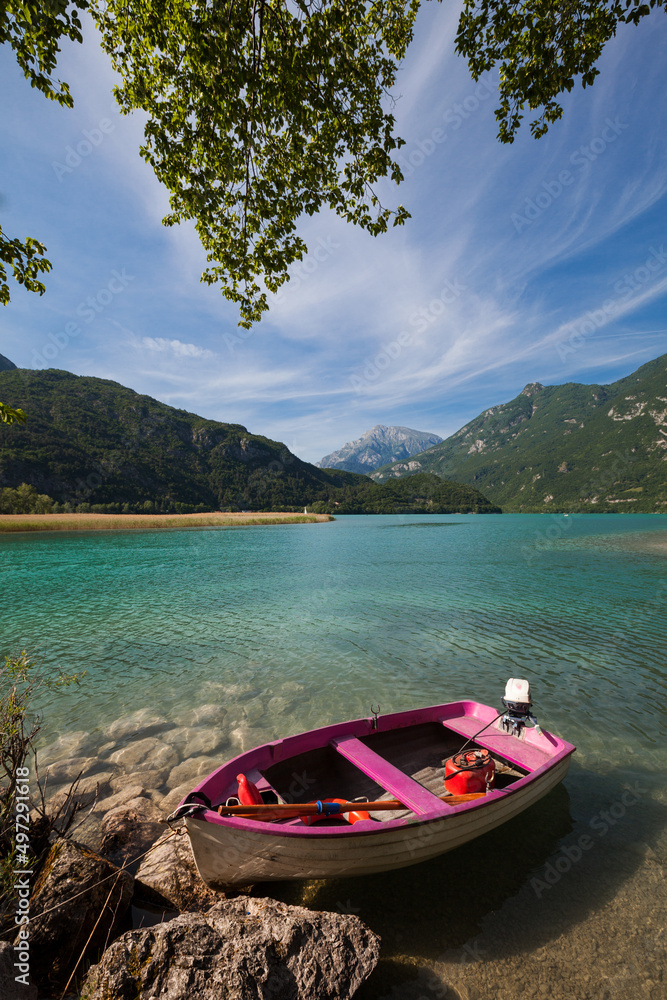Pink boat on tranquil summer lake  - Lago dei tre comuni - Lago di Cavazzo  - obrazy, fototapety, plakaty 