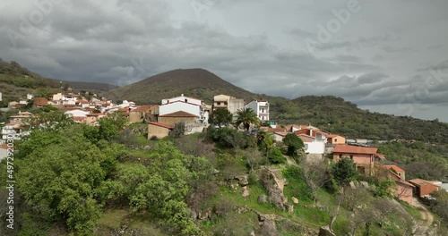 Stunning shoot of a village on the top of a hill photo