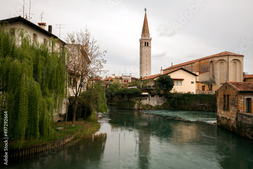 The Livenza river in the centre of town with Chatedral - Duomo di San Nicol - Sacile, Pordenone, Friuli Venezia Giulia, Italy