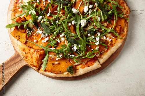 Gourmet wood fired pumpkin pizza on table