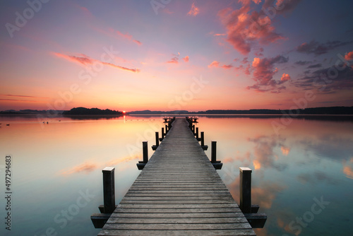 magical sunrise at wooden pier © Jenny Sturm