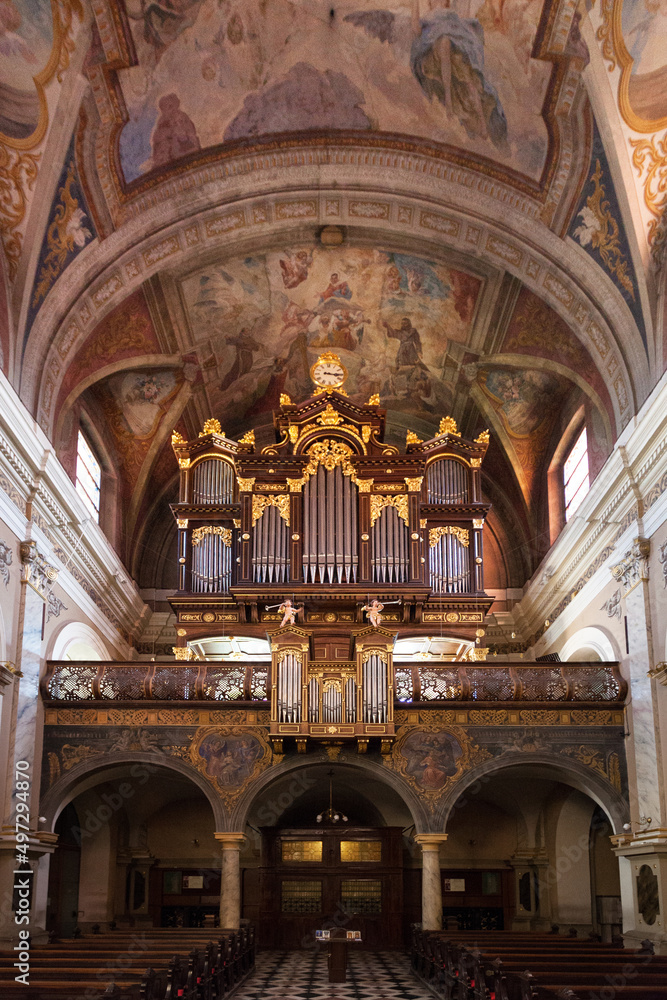 Fototapeta premium Franciscan Church of the Annunciation indoors vertical organ pipe detail