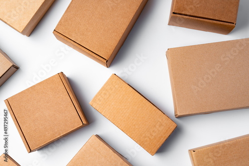 Tableau sur toile Lot of cardboard boxes on white background