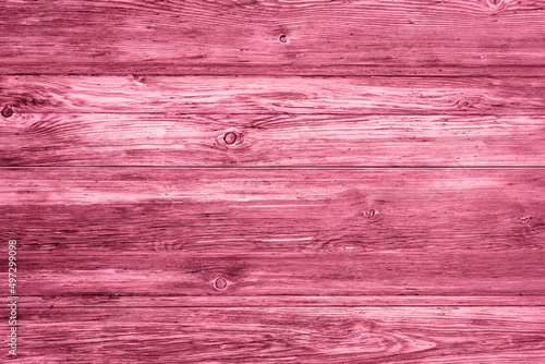Cherry pink aged wooden plank texture background, colorful surface