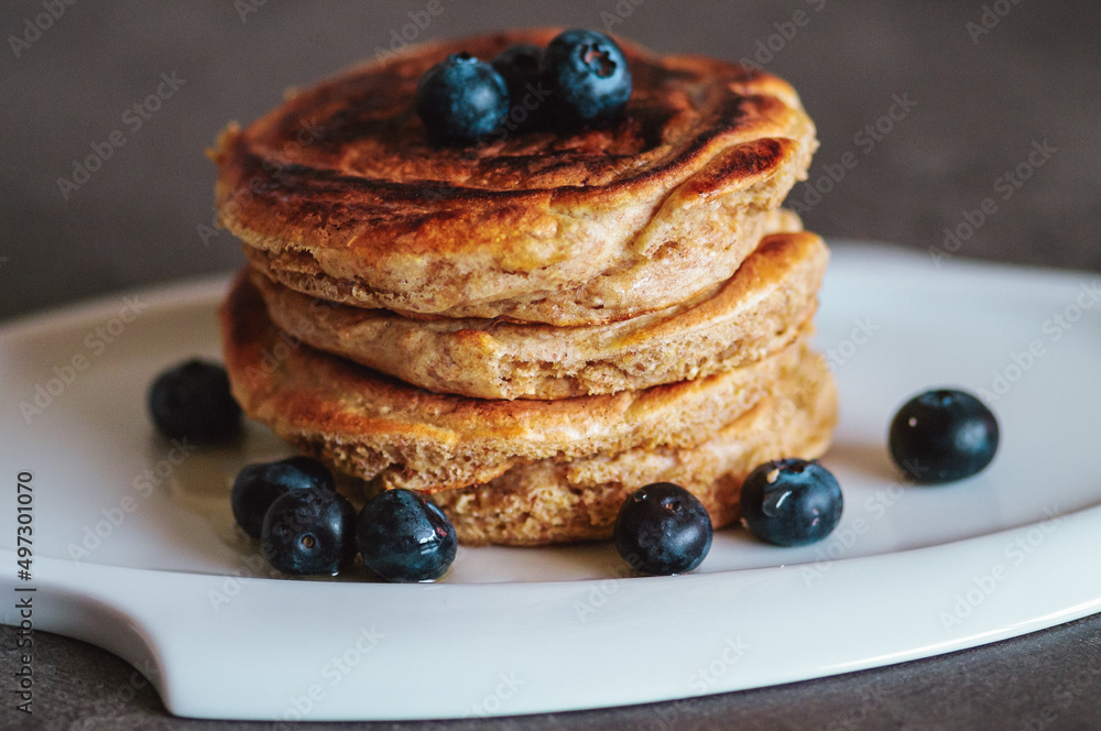 a pile of delicious blueberries pancakes a pile of delicious blueberries pancakes
