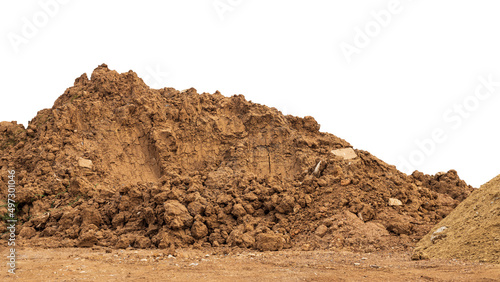 Brown mound isolates dug up and left on the ground to prepare for landfill. photo