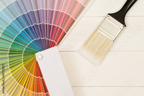 Texture paint cans and paint brushes and how to choose the perfect interior paint color and good for health photo