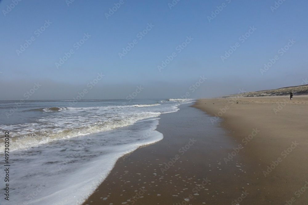 Beach at the Dutch North Sea coast on a sunny spring day (horizontal), Noordwijk, South Holland, Netherlands Beach at the Dutch North Sea coast on a sunny spring day (horizontal), Noordwijk, South Holland, Netherlands