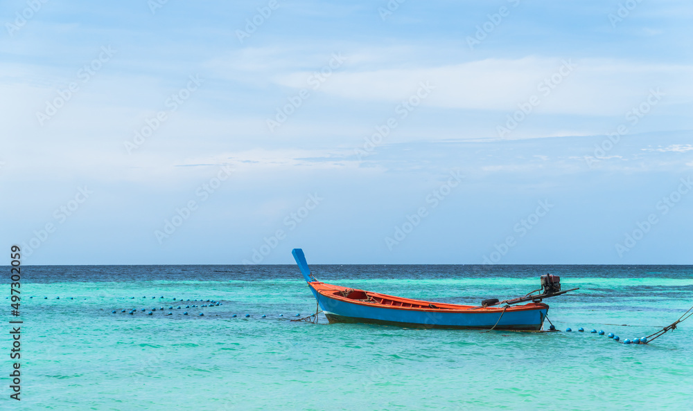 Naklejka premium boat on the beach