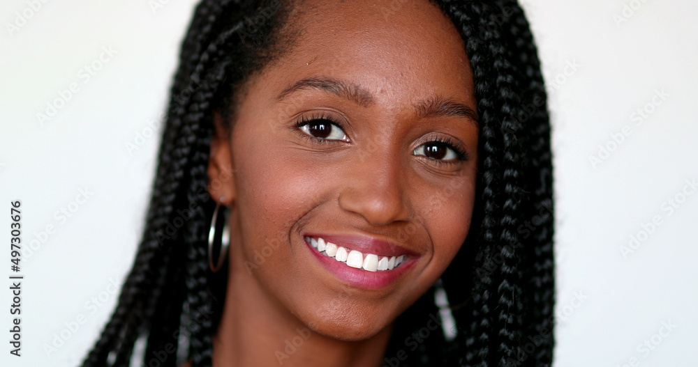 Pretty black African girl posing to camera. Teenager young woman portrait Pretty black African girl posing to camera. Teenager young woman portrait