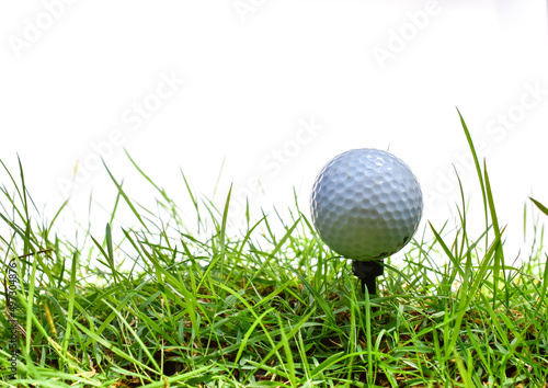 golf ball on green lawn green white background