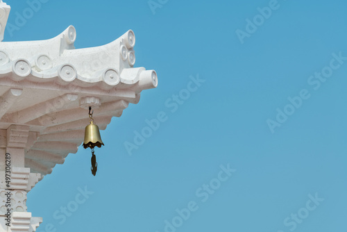 Bell on eaves of Chinese pagoda