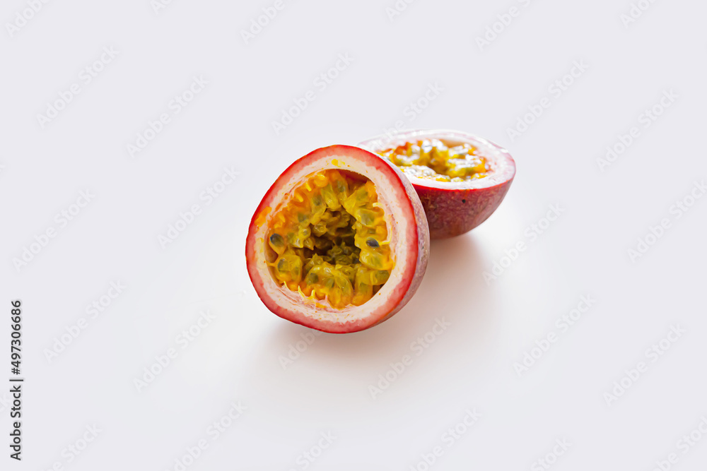 Passion fruit was cut isolated on white background Passion fruit was cut isolated on white background