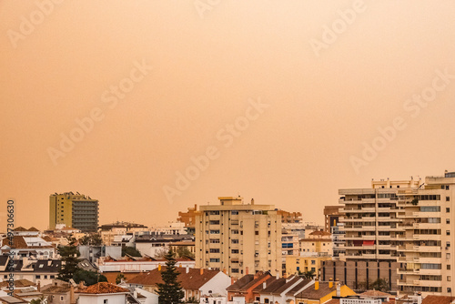Skyline of Fuengirola while Calima is on  photo